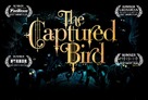 The Captured Bird - Canadian Logo (xs thumbnail)